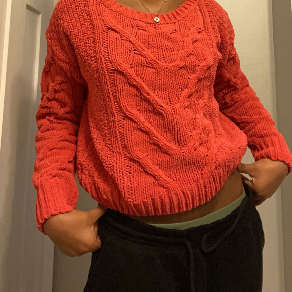 red/orange sweater